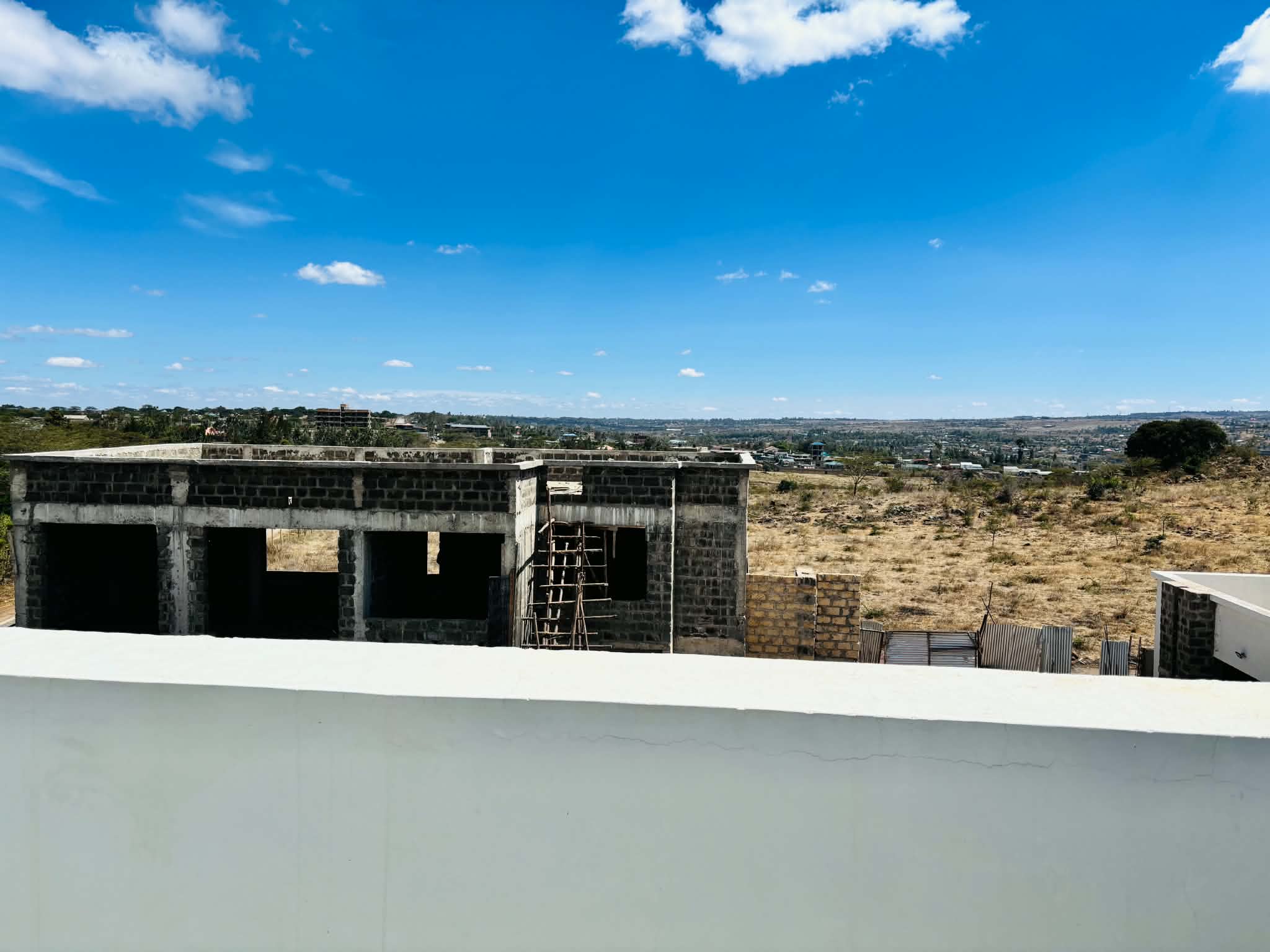View from a rooftop terrace across Kiserian