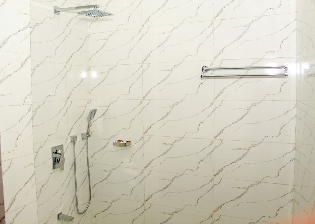 Marble-tiled luxury shower bathroom