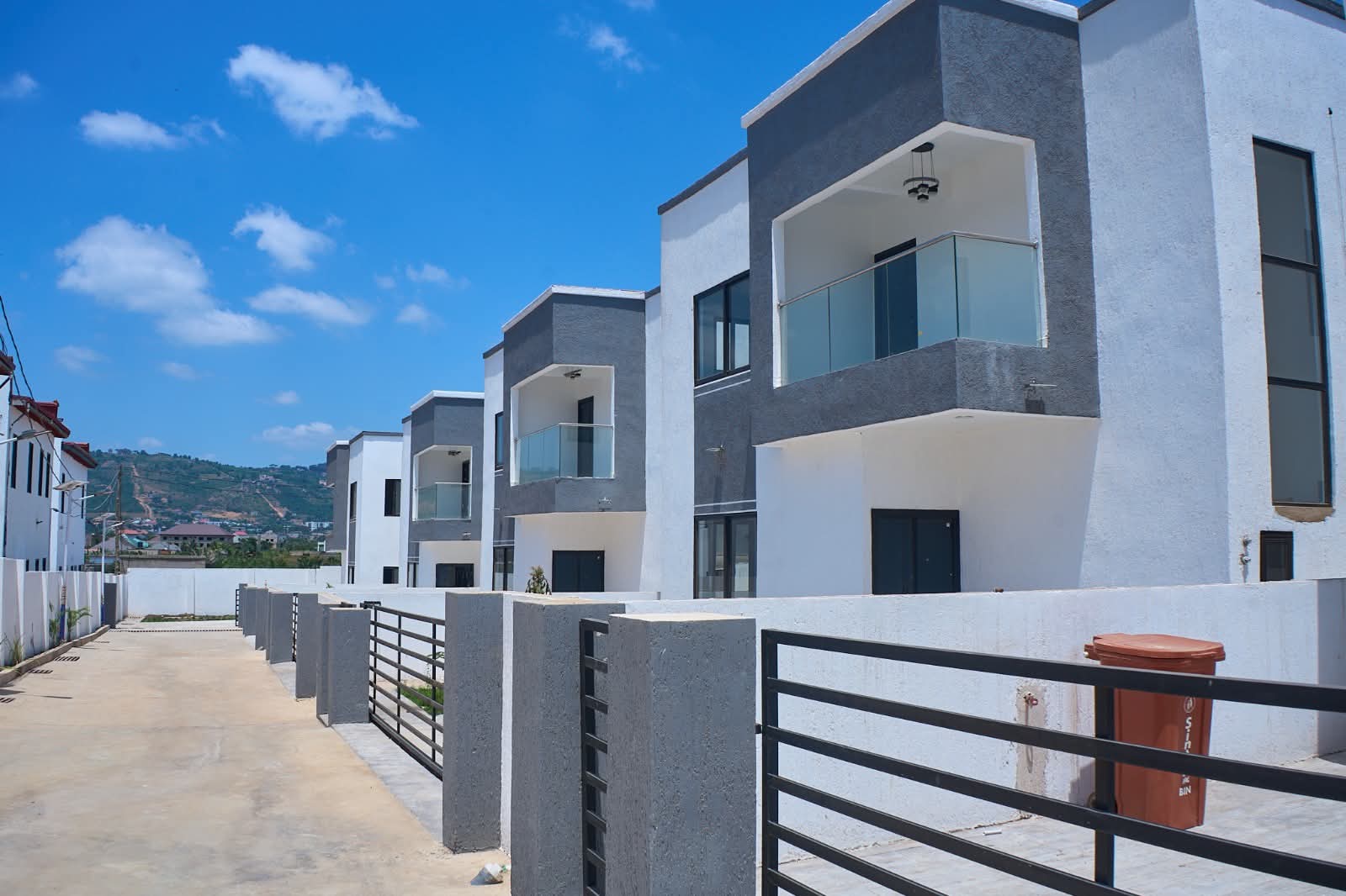 Row of villas with glass balconies